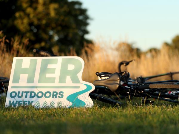 Bike outdoors with Her Outdoors Corrie board