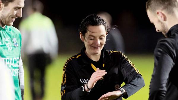 Referee Maggie Farrelly smiles as she carries out her duties as referee